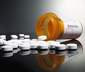 Spilled prescription medication --- Image by © Mark Weiss/Corbis